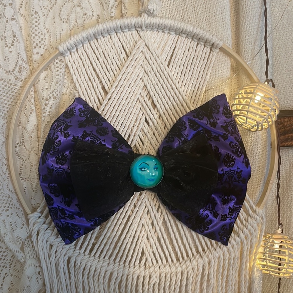 Disney haunted mansion big bow